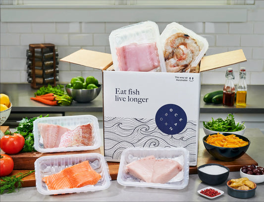 OceanBox Grill & BBQ Combo Box with Atlantic salmon, colossal shrimp, red snapper, mahi mahi and swordfish surrounded by fresh vegetables and herbs-Oceanbox